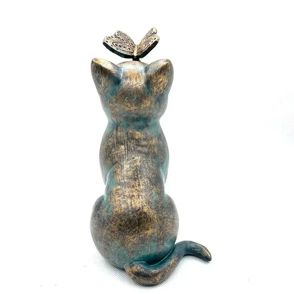 Statue jardin chat avec un papillon sur le nez - MiaouDéco