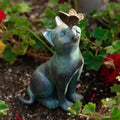 Statue jardin chat avec un papillon sur le nez - MiaouDéco